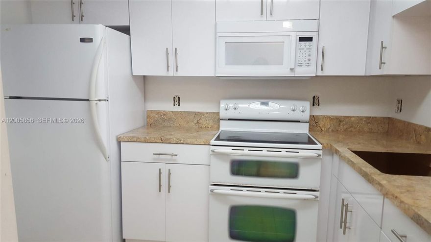 Community on Caribbean Blvd, near to US1 and Express Busway to Homestead. Tile throughout, modern style kitchen cabinets, 1 assigned parking and plenty guest, laundry room in each wing floor. The community is under structural upgrade, the roof and pool, parking stripping already done. Now is working is new elevators, concrete beams, balcony, railing and painting is the last job. Special Assessment in place $436, HOA $483. Currently rented long terms tenants.