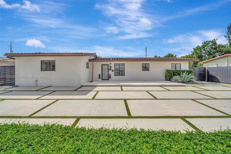 Welcome to Palm Springs North! This light and bright mid-century 3-bedroom home combines timeless design with modern upgrades and a split floorplan. The fully-fenced resort-style backyard features a sparkling pool surrounded by travertine pavers, lush artificial turf, and a covered patio ideal for entertaining. The oversized driveway accommodates multiple vehicles or a car collection. Inside, the chef’s kitchen boasts a natural gas range—a rare find in the area. With a newer roof, impact windows and doors, and quality finishes throughout, this home offers durability and efficiency in a great location—just 5 minutes to I-75 for an easy commute north or south through Miami-Dade or Broward County, and only 15 minutes to Weston. (Actual under air sq ft is 1561 per seller's purchase appraisal.)