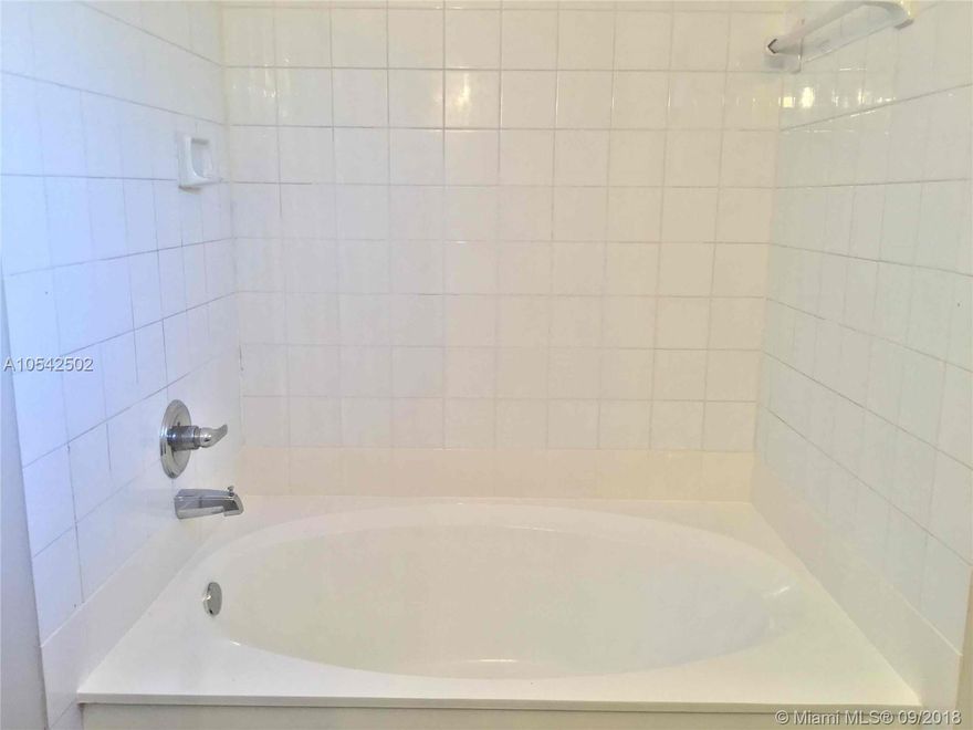 his 3 bedroom 2 bath, 1,800 sf home is located in Hialeah, FL. This home features beautiful tile floors, an updated kitchen with stainless steel appliances, spacious dining area and car garage.