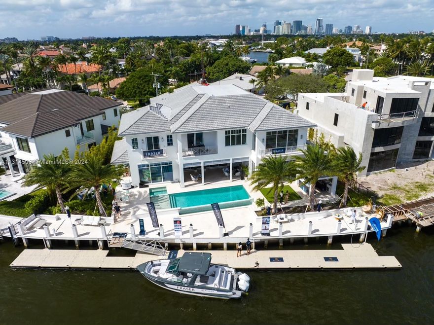 Welcome to 74 Isla Bahia Drive, located in Fort Lauderdale’s exclusive gated community of Harbor Beach which includes a private Beach club/Marina. This Turn Key New Construction home is NOW COMPLETE & is situated on the intracoastal with views of Lake Sylvan. Wide waterway with a massive 130ft dock that is 8ft wide with two power pedestals & can comfortably fit a 110 ft Yacht. This 7,900 SQFT home consists of 6 Bedrooms, 7 full bathrooms & 2 half baths and comes fully furnished. The first and the second floor each come equipped with their own master suites & impressive views with a total of 4 en-suite guest bedrooms. Potentional for 6-car garage w/ car lifts, infinity edge pool, custom cabinetry/vanities w/ marble countertops, Wolf/Sub-Zero appliances.