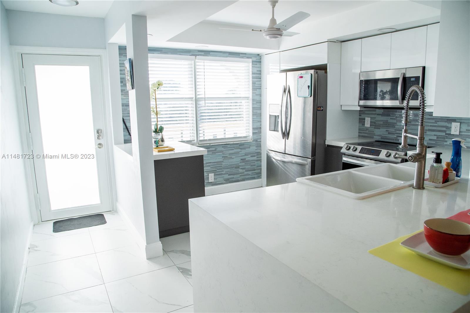 AMAZING TOTALLY REMODELED CONDO FURNISHED AND SPECTACULAR LAKE VIEW ON SPACIOUS BALCONY WITH HURRICANE WINDOWS. .