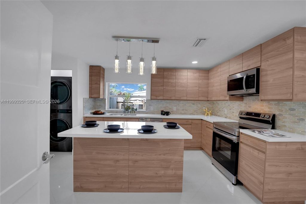 Photo of 1137 SW 8th Ave, Fort Lauderdale, FL 33315 (MLS # A11999320)