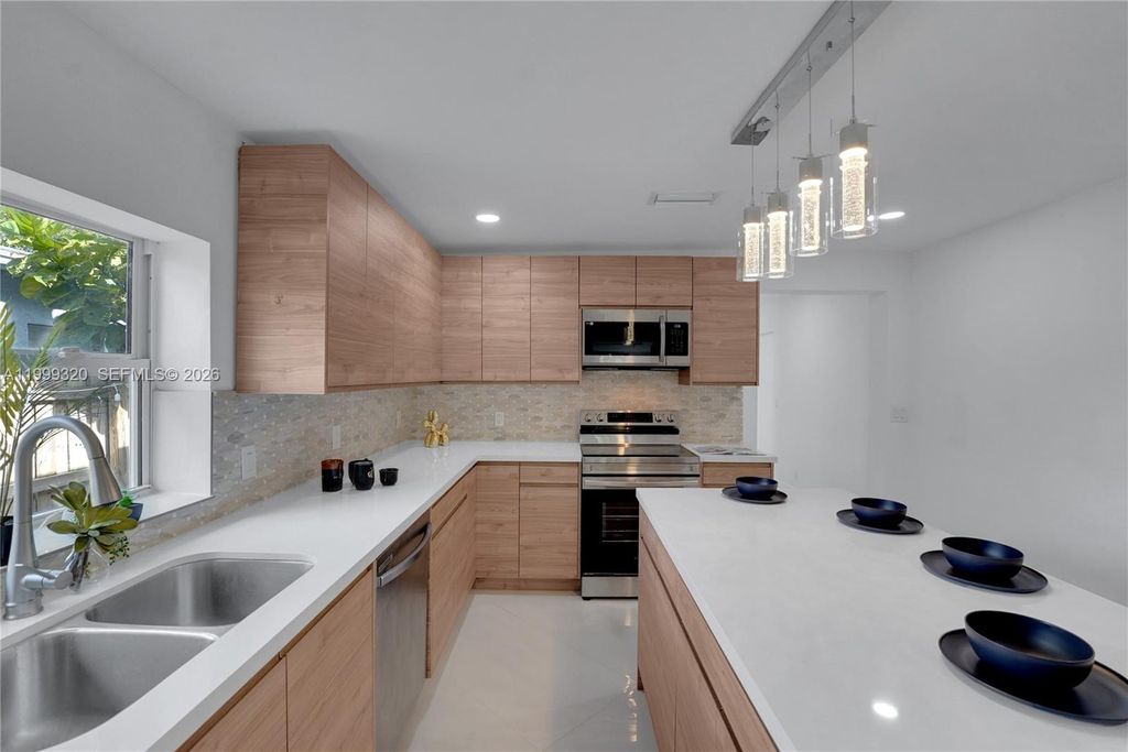 Photo of 1137 SW 8th Ave, Fort Lauderdale, FL 33315 (MLS # A11999320)