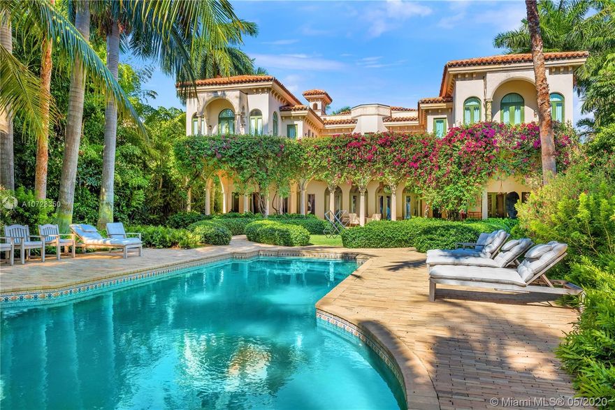 Located on exclusive Star Island, this exquisite estate offers a world of privacy & luxury. Tucked behind hand-crafted gates, an expansive motor court leads to a grand entrance. An incomparable living room w/stunning 35’ detailed domed ceilings boosts skylights & exquisite arched windows/doors. Interior features: formal dining room, library, office w/separate entrance & full bathroom, 2 grand stairways, beautiful iron work & gourmet
chef’s kitchen w/ top-of-the-line appliances. The grand master bedroom features a rooftop terrace, seating area, office area, expansive built-out closet & a spa-like master bath, marble floors & countertops, a floating tub & oversized marble shower. The verdant outdoors are complete w/luxuriant gardens, summer kitchen, dock, beautiful pool & wide bay views.