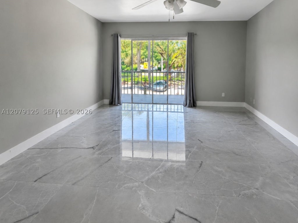 Photo of 3360 Spanish Moss Ter #204, Lauderhill, FL 33319 (MLS # A12079125)