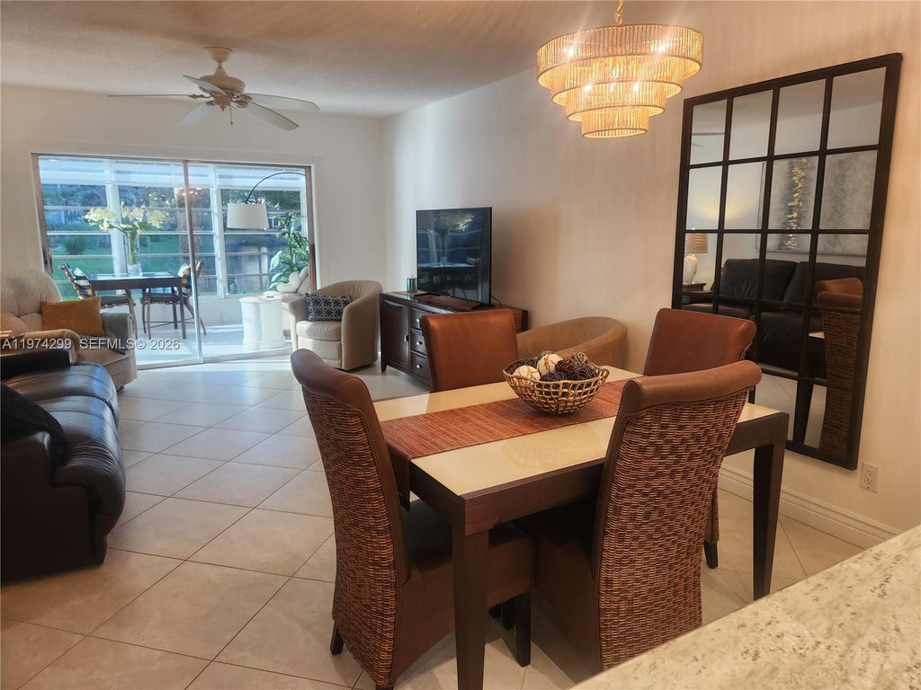 Photo of 5101 NW 34th St #101, Lauderdale Lakes, FL 33319 (MLS # A11974299)