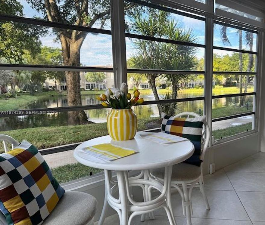 Beautiful apartment located on the first floor with tile flooring throughout and a lovely water view. This unit features impact windows, an updated kitchen and bathrooms, and comes fully furnished — turnkey and ready to move in.

Enjoy the convenience of a rear exterior door with direct access to the lake and walking area. The community offers excellent amenities, including shuffleboard and a clubhouse, and is in great financial condition with reserves and low association fees. Conveniently located close to expressways and shopping centers.

FIRPTA addendum applies. Foreign motivated seller — come see it and make your offer!