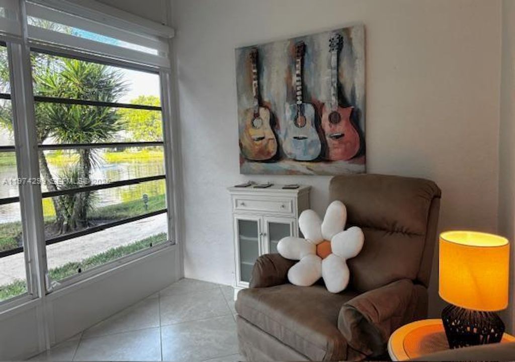 Photo of 5101 NW 34th St #101, Lauderdale Lakes, FL 33319 (MLS # A11974299)