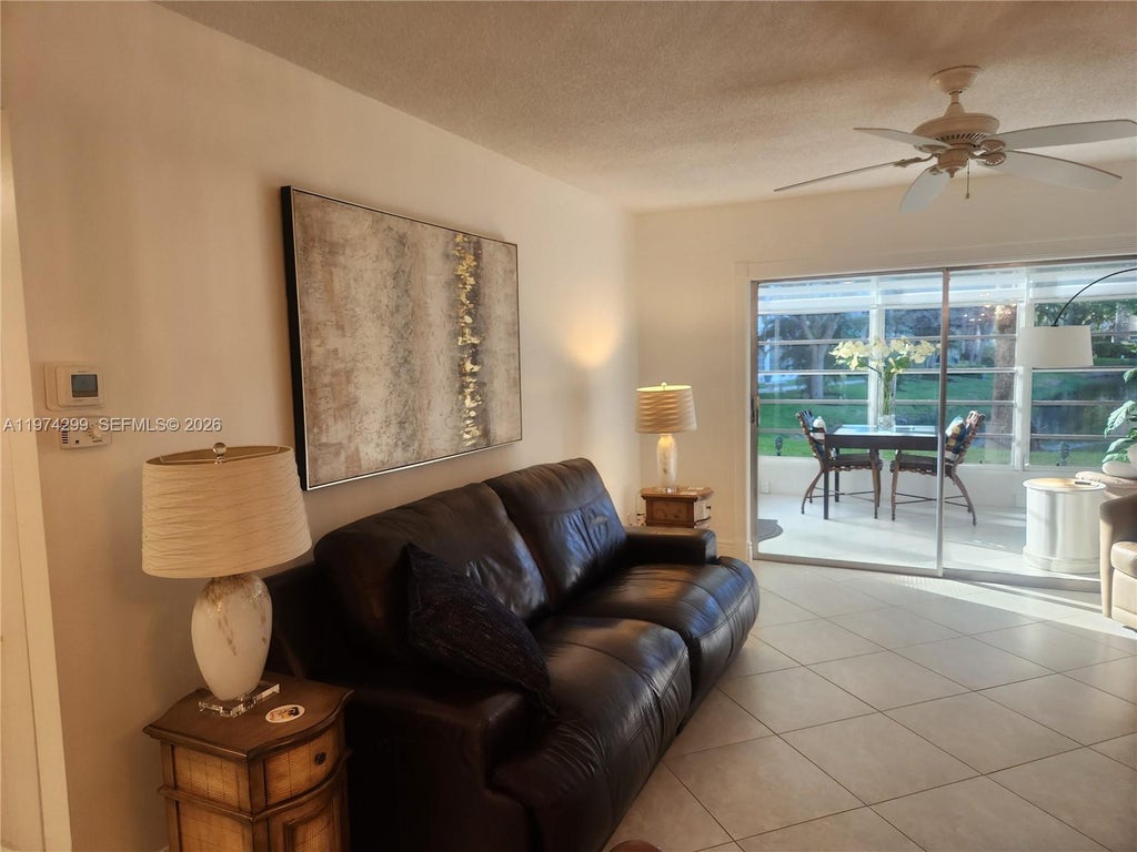 Photo of 5101 NW 34th St #101, Lauderdale Lakes, FL 33319 (MLS # A11974299)