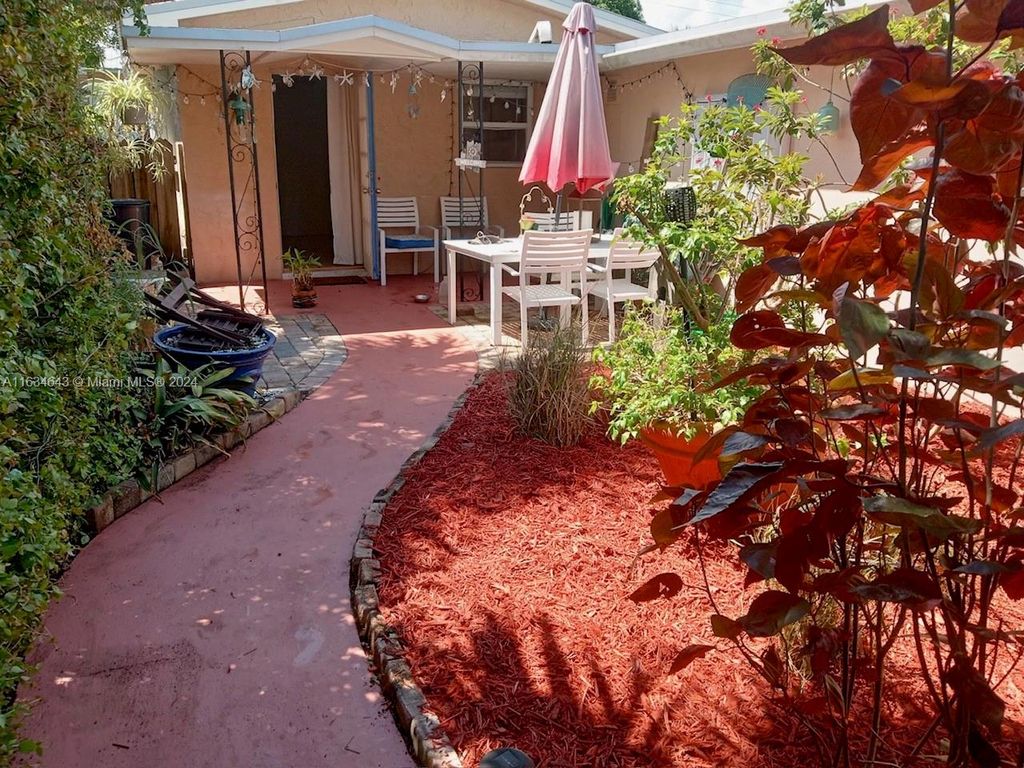 Photo of 1538 NE Sunview Ter, Jensen Beach, FL 34957 (MLS # A11634643)