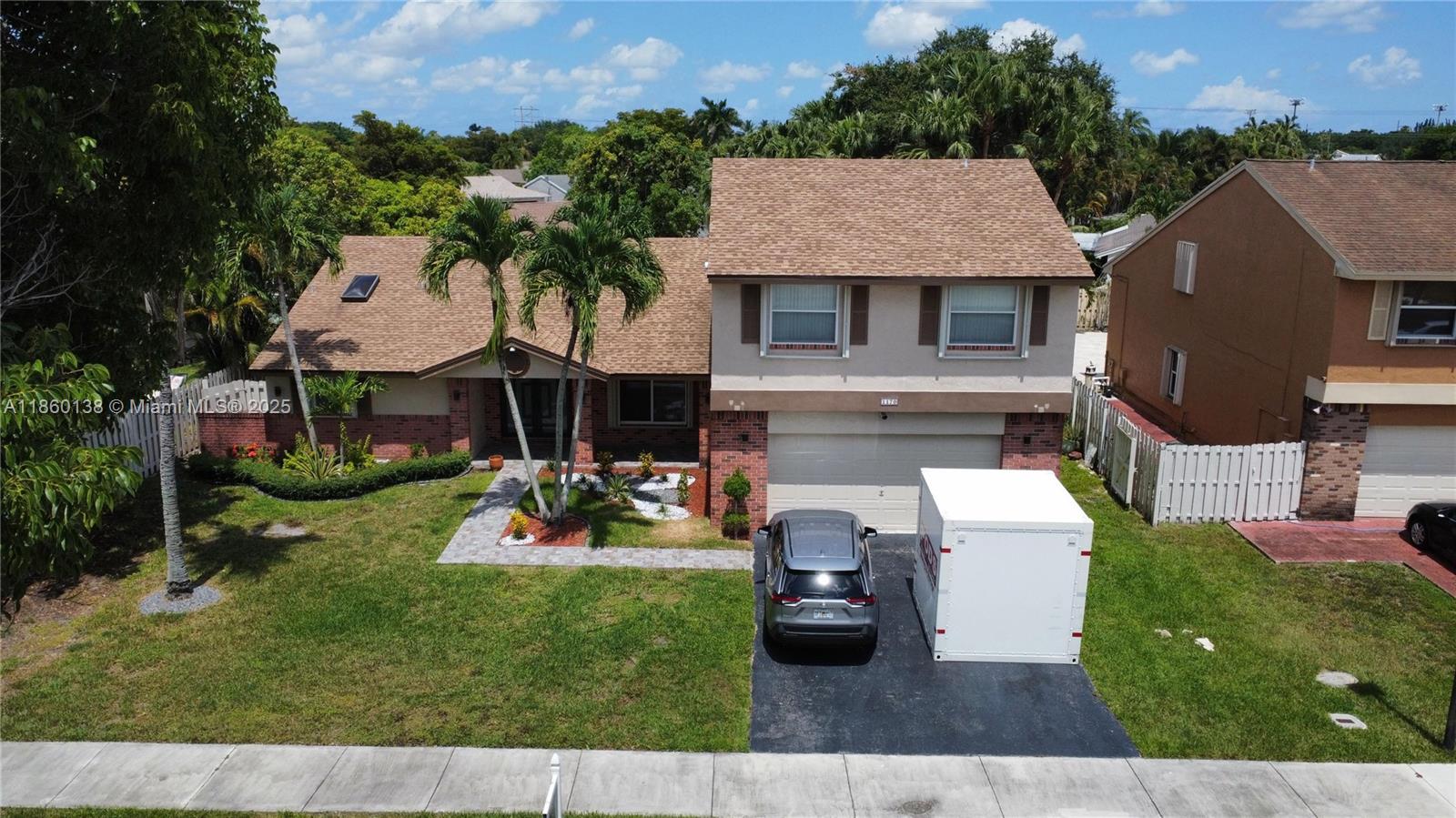 This fully remodeled 3-bedroom, 2.5-bathroom home offers modern comfort and style in a prime location. With brand-new upgrades throughout, including a sleek kitchen, updated bathrooms, and fresh flooring, this home is move-in ready and perfect for those seeking a comfortable living space. The spacious open floor plan includes a versatile office/studio, ideal for remote work or creative projects. Enjoy a screened roof patio and a large backyard for outdoor relaxation. Located just minutes from Weston and Sawgrass, you’ll have easy access to top shopping, dining, and entertainment. Plus, the home is within a highly-rated school district, making it an excellent choice for families. With its perfect blend of modern amenities and prime location, this home offers the ideal rental for families.