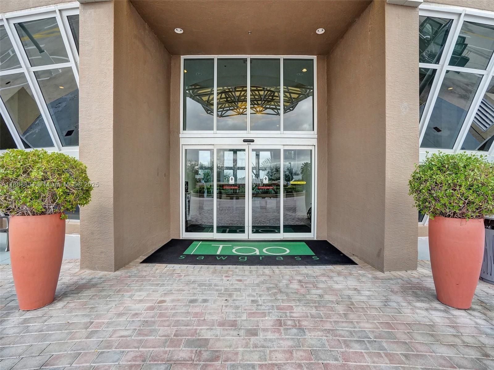 TAO SAWGRASS CONDOMINIUM - Residential Lease