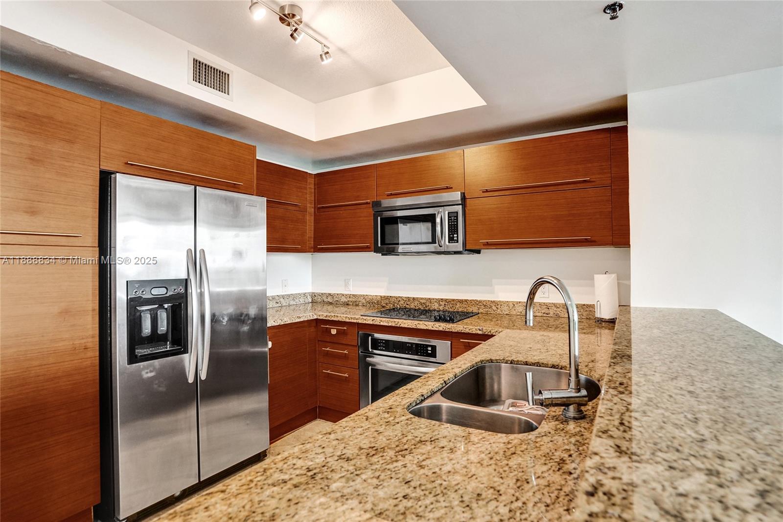 TAO SAWGRASS CONDOMINIUM - Residential Lease