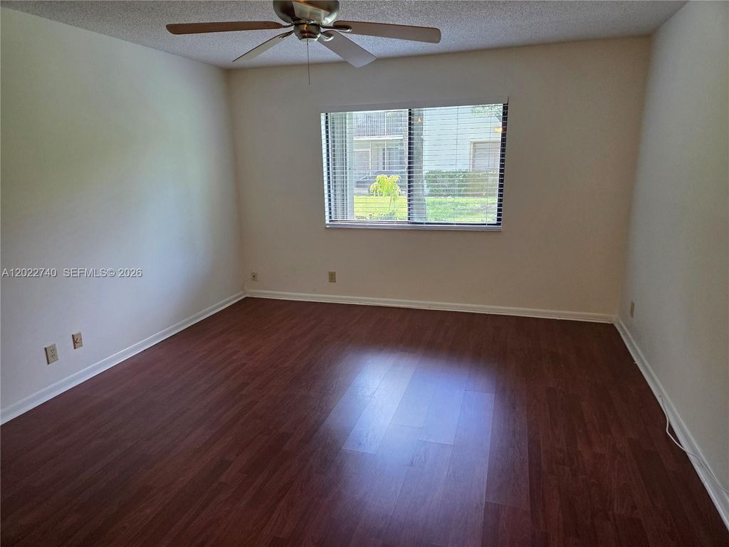 Photo of 413 Lakeview Dr #104, Weston, FL 33326 (MLS # A12022740)