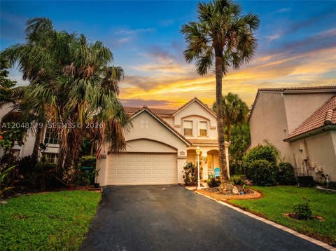 Photo of 3871 Jasmine Ln, Coral Springs, FL 33065 (MLS # A12048179)
