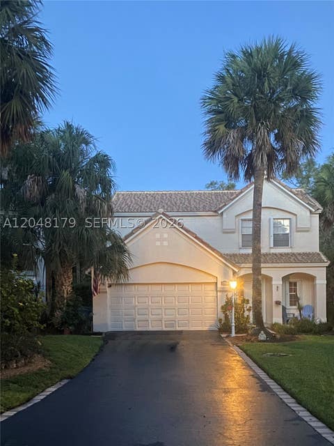 Photo of 3871 Jasmine Ln, Coral Springs, FL 33065 (MLS # A12048179)