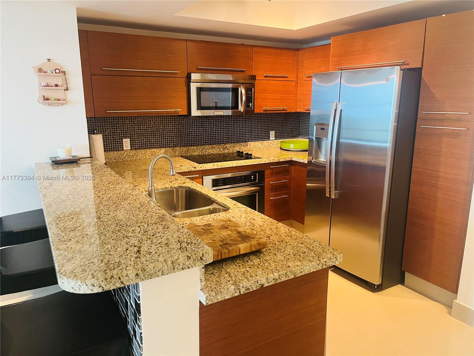 TAO SAWGRASS CONDOMINIUM - Residential