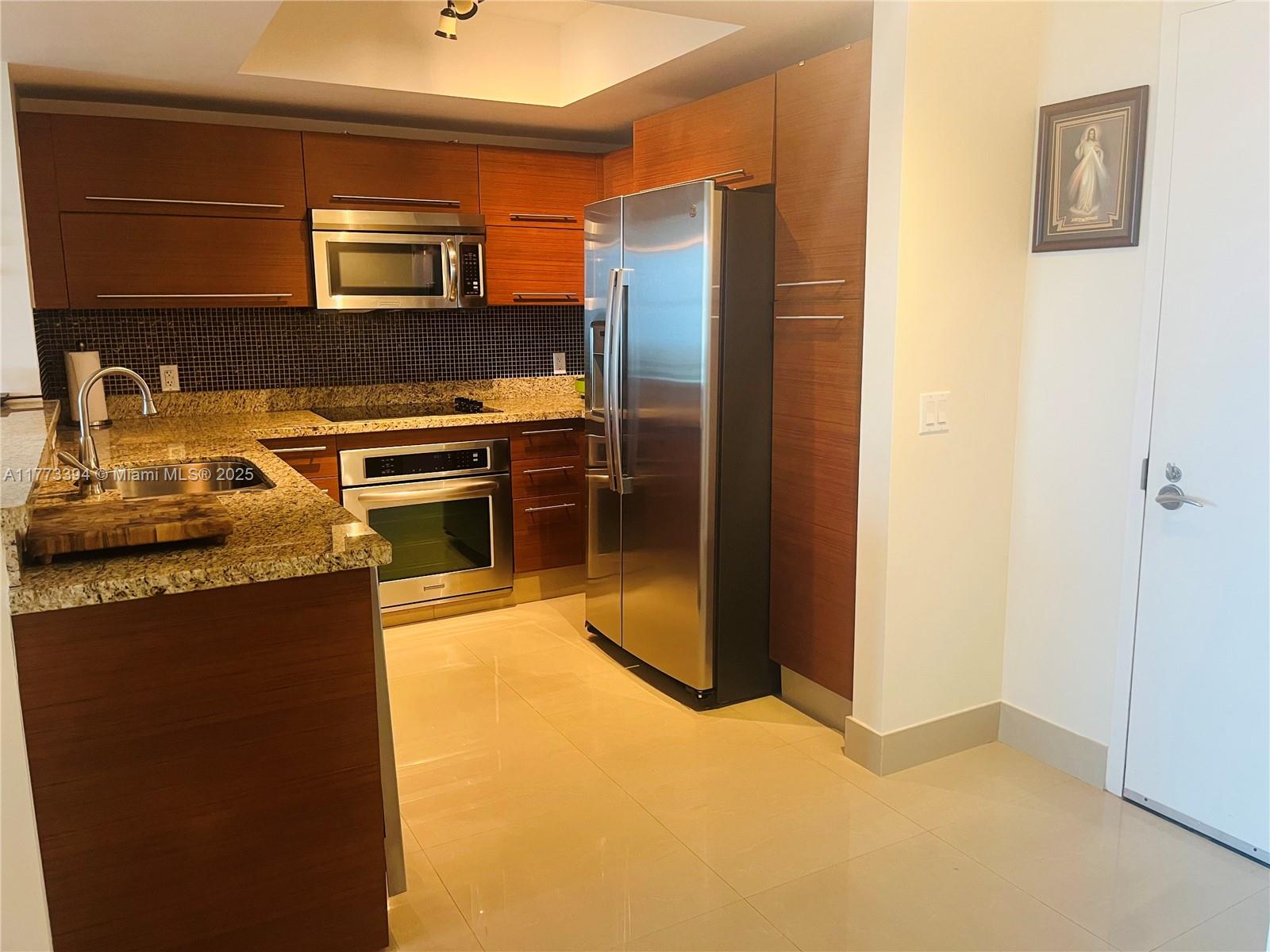 TAO SAWGRASS CONDOMINIUM - Residential