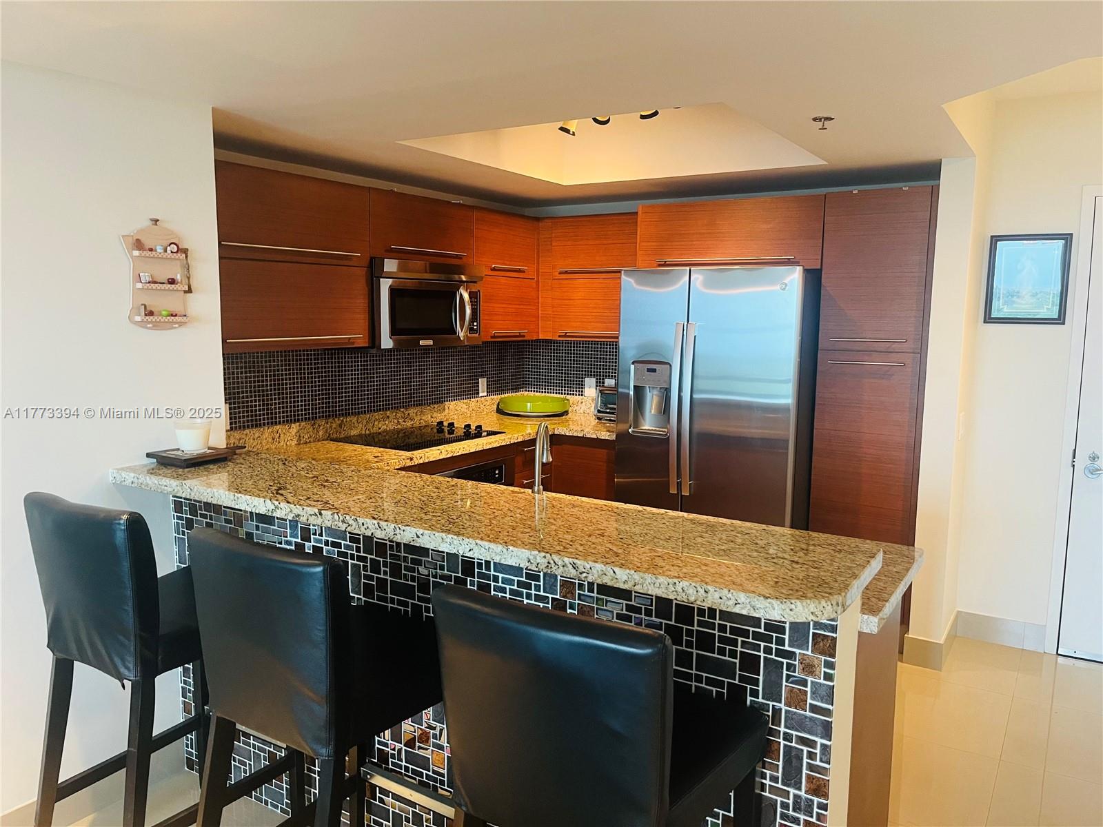 TAO SAWGRASS CONDOMINIUM - Residential