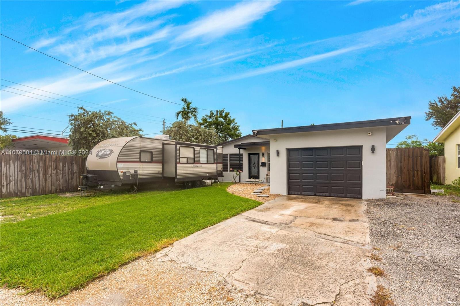 Welcome to a beautifully remodeled 3-bedroom, 2-bathroom home located in the heart of Fort Lauderdale. This residence offers modern comfort and convenience with updated finishes throughout. The spacious living areas are perfect for relaxing or entertaining guests. The home also features impact windows throughout, offering enhanced safety and efficiency, as well as a 1-car garage, providing ample storage and parking.