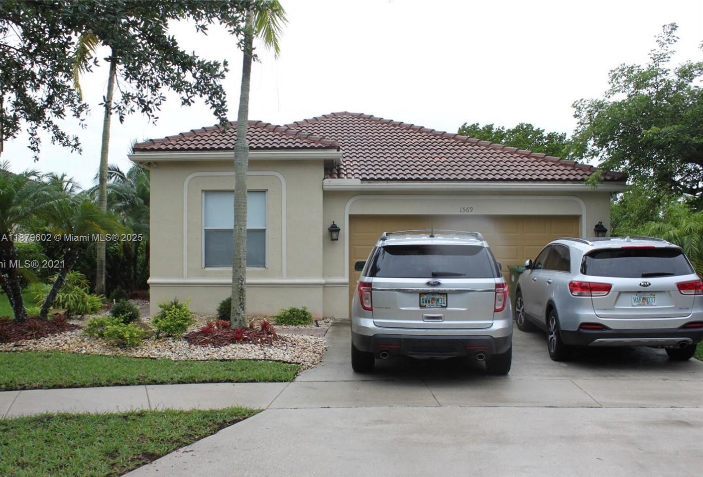 Welcome to this updated one-story home with a split floor plan. Porcelain tile is used throughout the main living areas, and laminate floors are used in the bedrooms. The fourth bedroom is currently set up as a home office, offering flexibility to fit your needs. Modern kitchen with granite countertops, stainless steel appliances, and 42" upper cabinets for plenty of storage. 5-year roof. Secluded and private backyard. Extended driveway fits up to four cars comfortably. This home is part of a gated community with great amenities, including three pools, mini-golf, basketball, baseball/soccer fields, and access to highly rated schools.