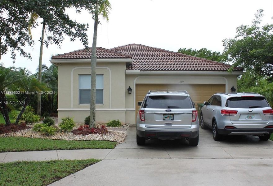 Welcome to this updated one-story home with a split floor plan. Porcelain tile is used throughout the main living areas, and laminate floors are used in the bedrooms. The fourth bedroom is currently set up as a home office, offering flexibility to fit your needs. Modern kitchen with granite countertops, stainless steel appliances, and 42" upper cabinets for plenty of storage.  5-year roof. Secluded and private backyard. Extended driveway fits up to four cars comfortably. This home is part of a gated community with great amenities, including three pools, mini-golf, basketball, baseball/soccer fields, and access to highly rated schools.