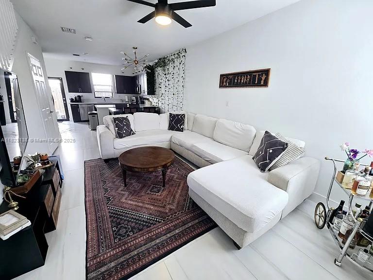 This updated,turnkey 3-bedroom,2.5-bathroom unfurnished townhome,built in 2021,is move-in ready and offers modern luxury and convenience.Located short distance to Broward Blvd with easy I-95 access,it's just 10 minutes from Las Olas Boulevard and Downtown Fort Lauderdale. Inside, enjoy brand-new flooring,an open-concept living area,and a fully equipped kitchen with nearly new appliances and gated community. The townhome will be unfurnished,offering a hassle-free move-in experience with stylish pieces throughout. Upstairs,the spacious master suite includes an en-suite bathroom for added privacy.The backyard features turf and stylish outdoor furniture,best suited for entertaining or relaxing.With two EV chargers and a Ring camera system for added security.Furnished option available at $3600.