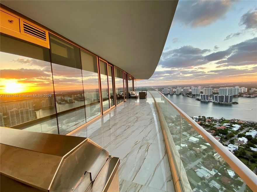 EXCLUSIVE Armani residence!! PANORAMIC breathtaking views from 51st floor corner unit! STUNNING views with floor to ceiling windows in every room! UNBEATABLE sights of ocean, bay and city from OVERSIZED 1000sqft wraparound balcony that rivals many penthouses! See it in person to believe it!! Polished Porcelain Carrara style tile floors, wine cooler, built in coffee maker, bidet toilet, luxurious Wolf appliances, and Subzero fridge. Armani fitness center with ocean views, 24 hour concierge, free valet parking, direct beach access, 2 hot tubs, private movie theater, heated pool, cigar room, children play area, billiards and card game room, Armani spa, private restaurant and bar. These high class amenities for your every need! FULLY FURNISHED with LUXURIOUS ITALIAN FURNITURE! Don't miss it!!!