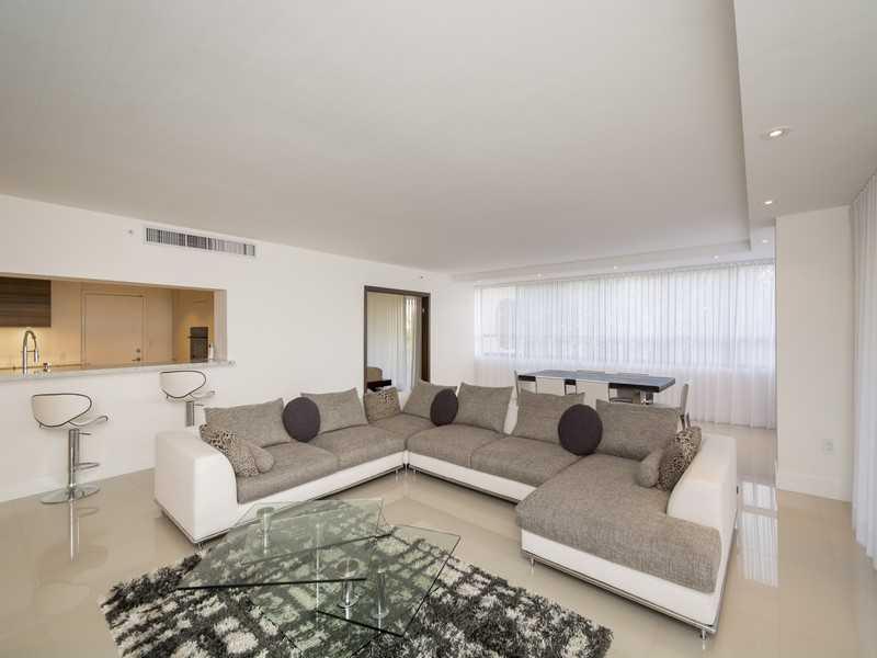 Totally Remodeled !  Large Corner Unit , Top of the Line  Appliances: Miele , Wolf , Sub Zero , POGGENPOHL Kitchen Cabinets / Large Master Suite / Oversized Custom Built  Wardrobe / Modern Designed Bathrooms / Washer and Dryer , Pantry room , 3 Balconies  !  New Impact Windows and Sliding doors! Turn key unit !