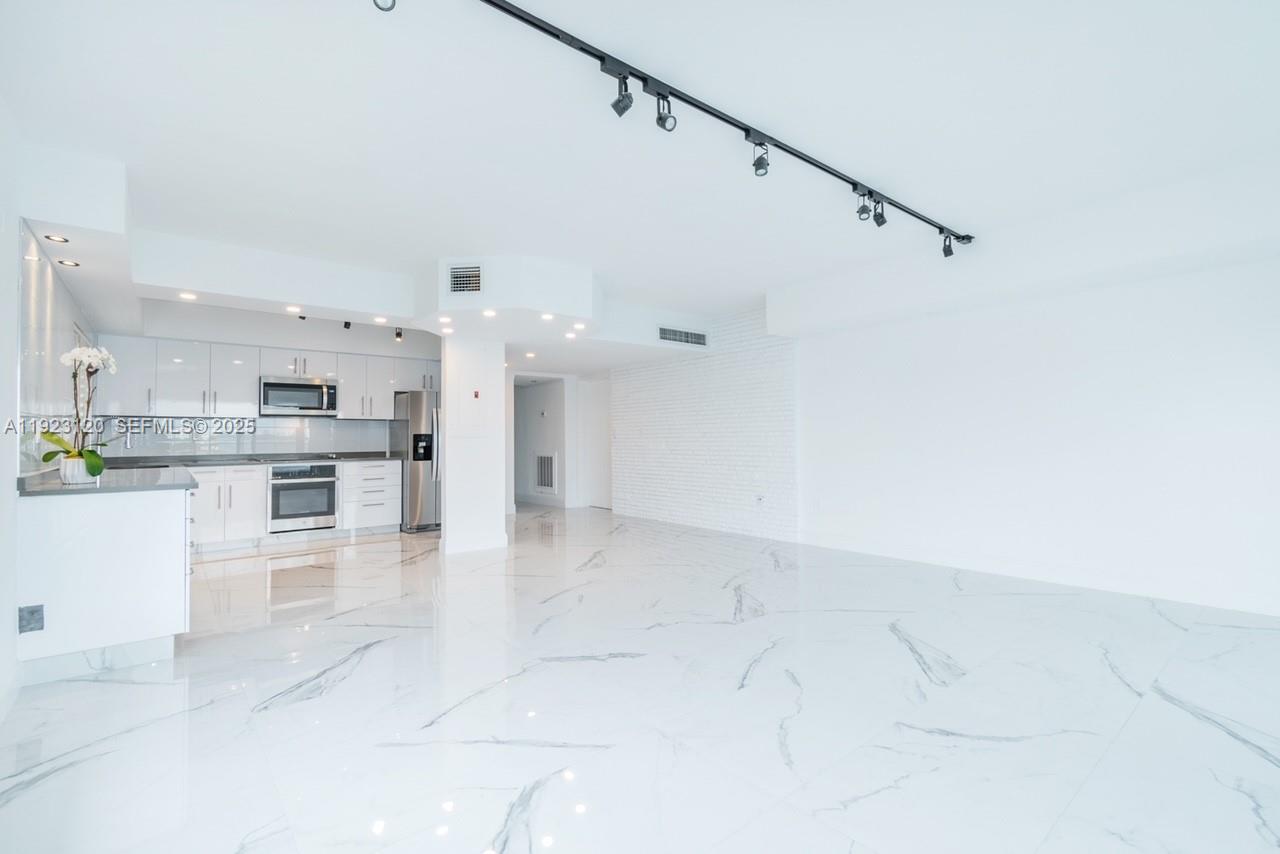 WATERS EDGE HOUSE CONDO - Residential Lease