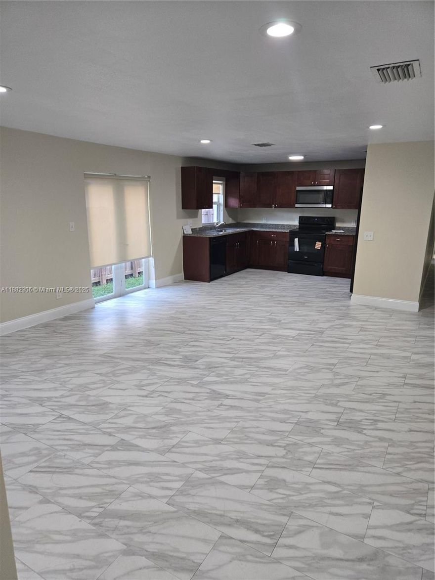 LARGE 3/2 BUILT IN 2019 - REAL CLEAN - BEAUTIFUL UNIT - GRANITE COUNTERTOPS - PORCELAIN TILE - GARAGE - MASTER BEDROOM WITH FRENCH DOORS , LEADS OUT TO A PRIVATE FENCED YARD - WALK IN CLOSETS - HURRICANE IMPACT WINDOWS - NEW PAINT - NEW STOVE - NO CONDO ASSOCIATION - 2 CAR MAX - THIS ONE IS A MUST SEE ! TEXT ONLY