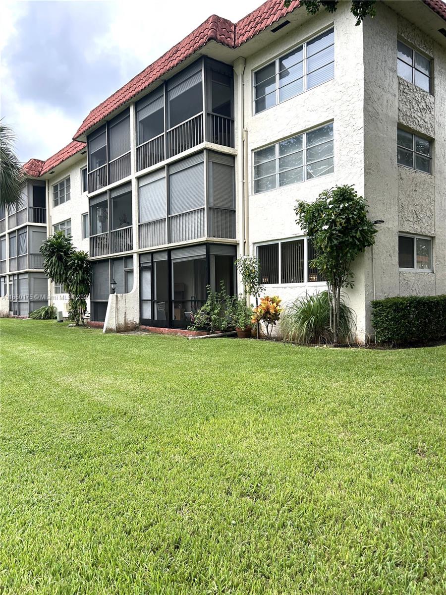 This spacious amazing 1 bedroom w/convertible family room/2nd bedroom, 2 full bath first floor corner unit sits directly on the Par 3 giving you a pristine garden view from your private screened patio. This unit features high impact windows, brand new dishwasher, A/C 2010, water heater 2021, ample storage space, wood laminate & tile floors throughout. There is an on-site restaurant, and the FREE GPA golf course. Yearly restaurant voucher fee of $400 per unit due every October. REC FEE is paid in full. Seller motivated bring all reasonable offers