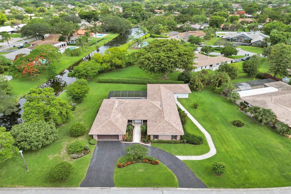 Photo of 1342 NW 100th Dr, Coral Springs, FL 33071 (MLS # A11410879)