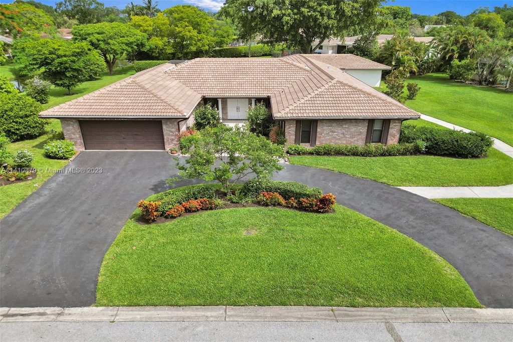 Photo of 1342 NW 100th Dr, Coral Springs, FL 33071 (MLS # A11410879)