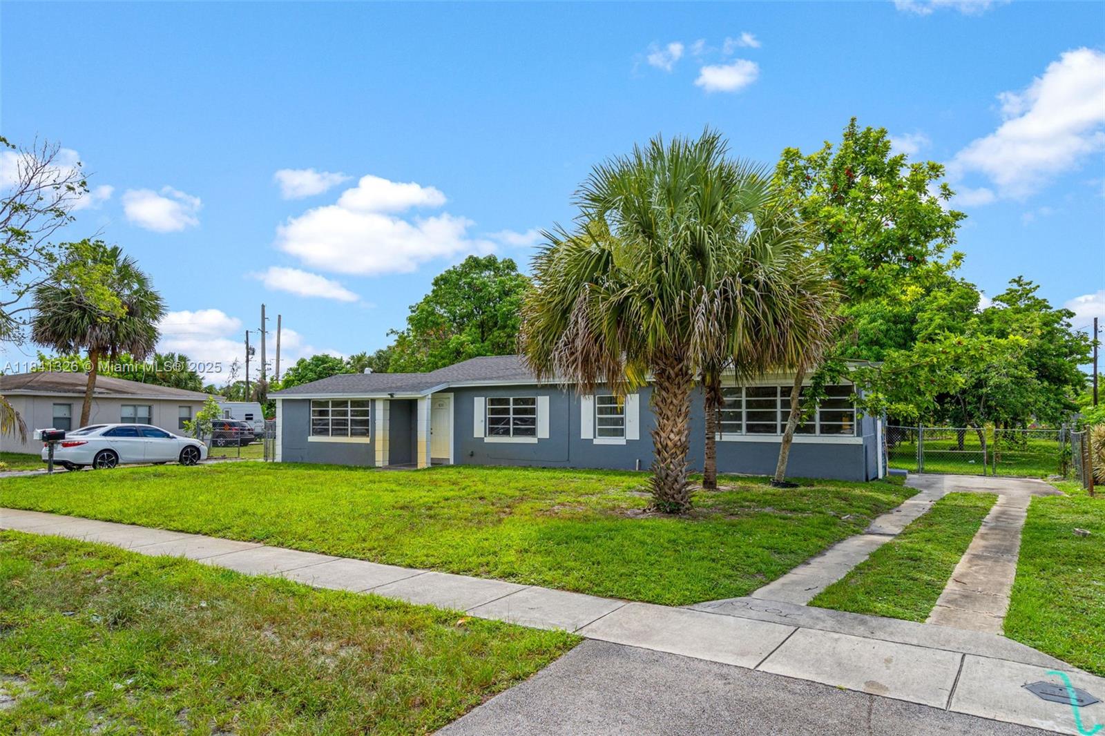 Just painted and ready for move-in! Quaint, airy, and bright. This two-bedroom, one-bath unit has NO Association. Driveway in front of the door, great location! Landscape and water included. Must be seen to appreciate. Call Mari today; it won't last.