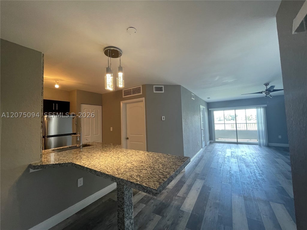 Photo of 4158 Inverrary Dr #503, Lauderhill, FL 33319 (MLS # A12075094)