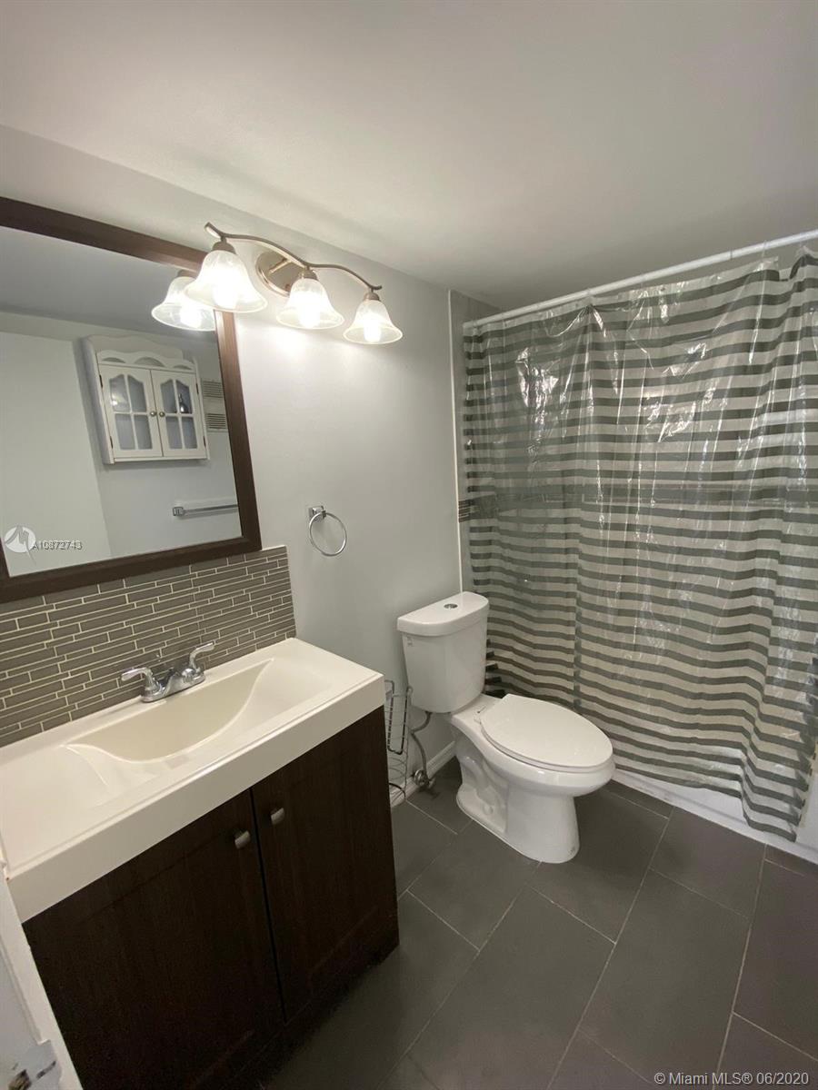 Great opportunity for 1st time buyers or investors. Beautiful, secured community with great amenities! Second floor with spacious balcony overlooking the club house and common areas, Elevator, Huge bedroom with great walk-in closet and lots of storage. Open living/dining room. Low maintenance. Excellent location near major expressways and great proximity to restaurants, supermarket and shopping centers. Laundry facilities