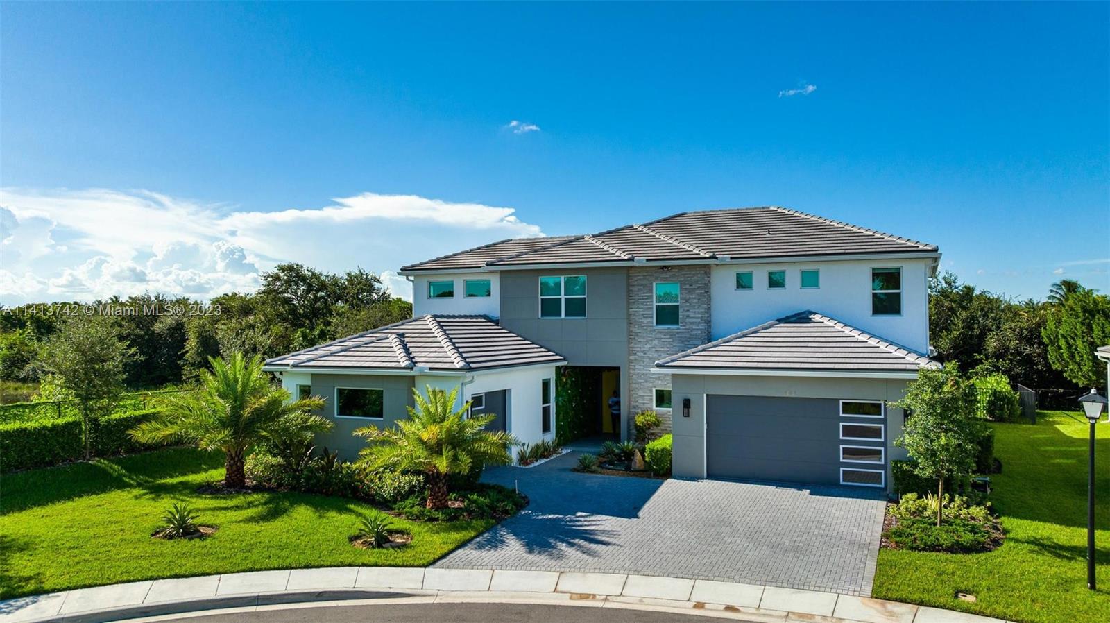 LIVE IN THE MOST EXCLUSIVE COMMUNITY IN MIRAMAR!!!... The home of your dreams just arrived and is costume made for your high standards of living... This magnificent home has 6 bedrooms plus a huge office at ground level with 5 baths and 3 car garage, 1 Master bedroom and a second bedroom at ground level too with a pool. Custom home with custom closets in all the rooms, Featuring 20' ceilings in the spacious living room, stainless steel handrails and an extra large breakfast area open to the gourmet kitchen, this will certainly satisfy the most particular of home chefs and entertainers alike with a wine cellar. Spectacular wood recovering in different areas, second floor hardwood, Hunter Douglas automatic blinds all over the house and bedrooms. Gated and intimate with only 20 home sites.