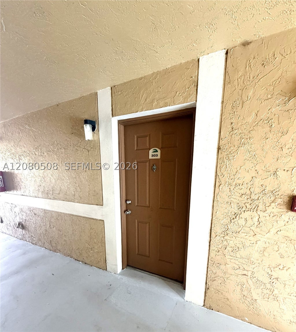 Photo of 351 Palm Way #303, Pembroke Pines, FL 33025 (MLS # A12080508)