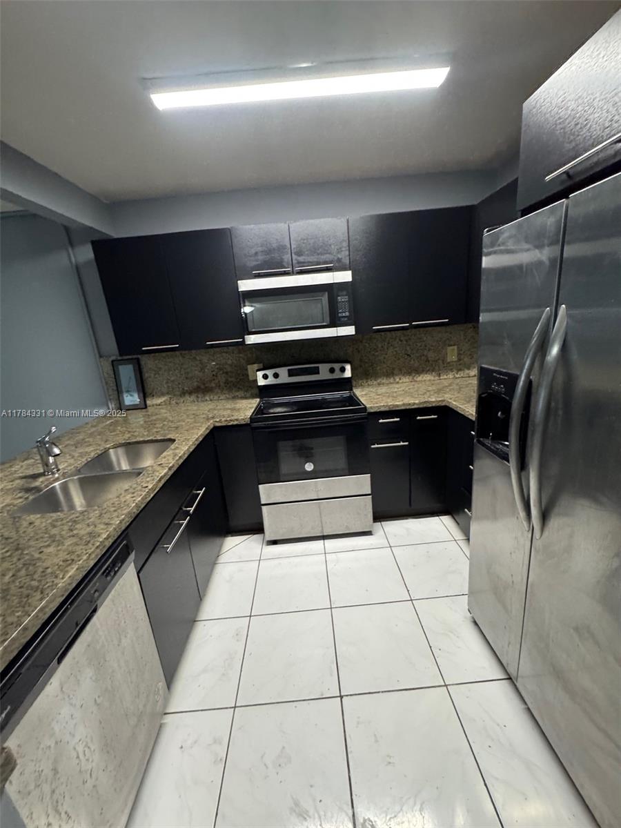 **INCREDIBLE INVESTOR OPPORTUNITY- CASH ONLY-- MARKET RENT POTENTIAL UPWARDS OF $3400 WITH SECTION 8--CASH COW***This spacious 4/2.5 (plus den) 1,440 sq ft townhouse at Sunrise Towne Preferred Assoc is a MUST-SEE! Property features one bedroom downstairs (plus den) with 3 bedrooms upstairs. Unit has tile floors throughout and central and Newer Washer and Dryer and Dishwasher along with a newer water heater. Kitchen features granite countertops with stainless steel appliances and upgraded kitchen cabinetry. Master Bedroom is HUGE with 2 walk-in closets and a screened in patio. Association requires BUYER (just 1) to have at least a 650 credit score. COA $375.00 p/m. COA has no master insurance policy and is transitioning from a COA to HOA. BRAND NEW ROOFS COMING THIS YEAR- HOA tO BE $70 P/M