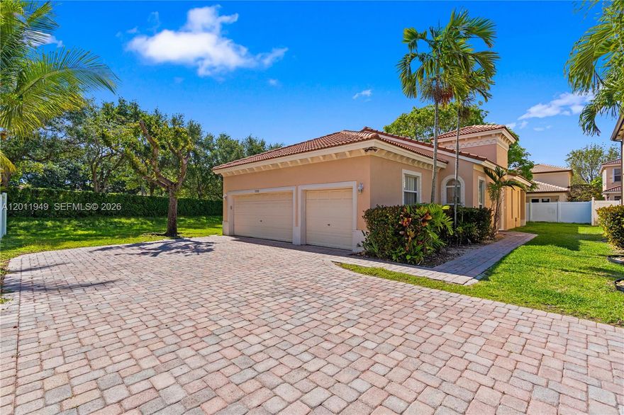 This spacious home located within Waterston, a state of the art development with various subdivisions, Portofino Oaks where the property is located is one circle of homes so that is very private with no thru traffic. The home is a corner lot with a 3 car garage . This oversized lot has an expansive driveway which can fit 6 cars not including the garages. The lot is partially fenced and is private. Newer Washer dryer, newer refrigerator, roof is well maintained. The Master bedroom has a spacious California closet system.  The inexpensive HOA of 150.00 a month covers the cutting of the lawn front and back, clubhouse and manned gate on Waterstone entrance. This home has a great location near Turnpike, Baptist Hospital and Homestead Airfare Base and A+ Charter k-8 School. Also, less than 2 miles are restaurants and shopping.