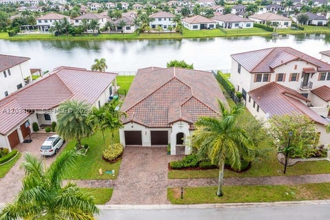 Photo of 3091 NW 82nd Way, Cooper City, FL 33024 (MLS # A12034011)