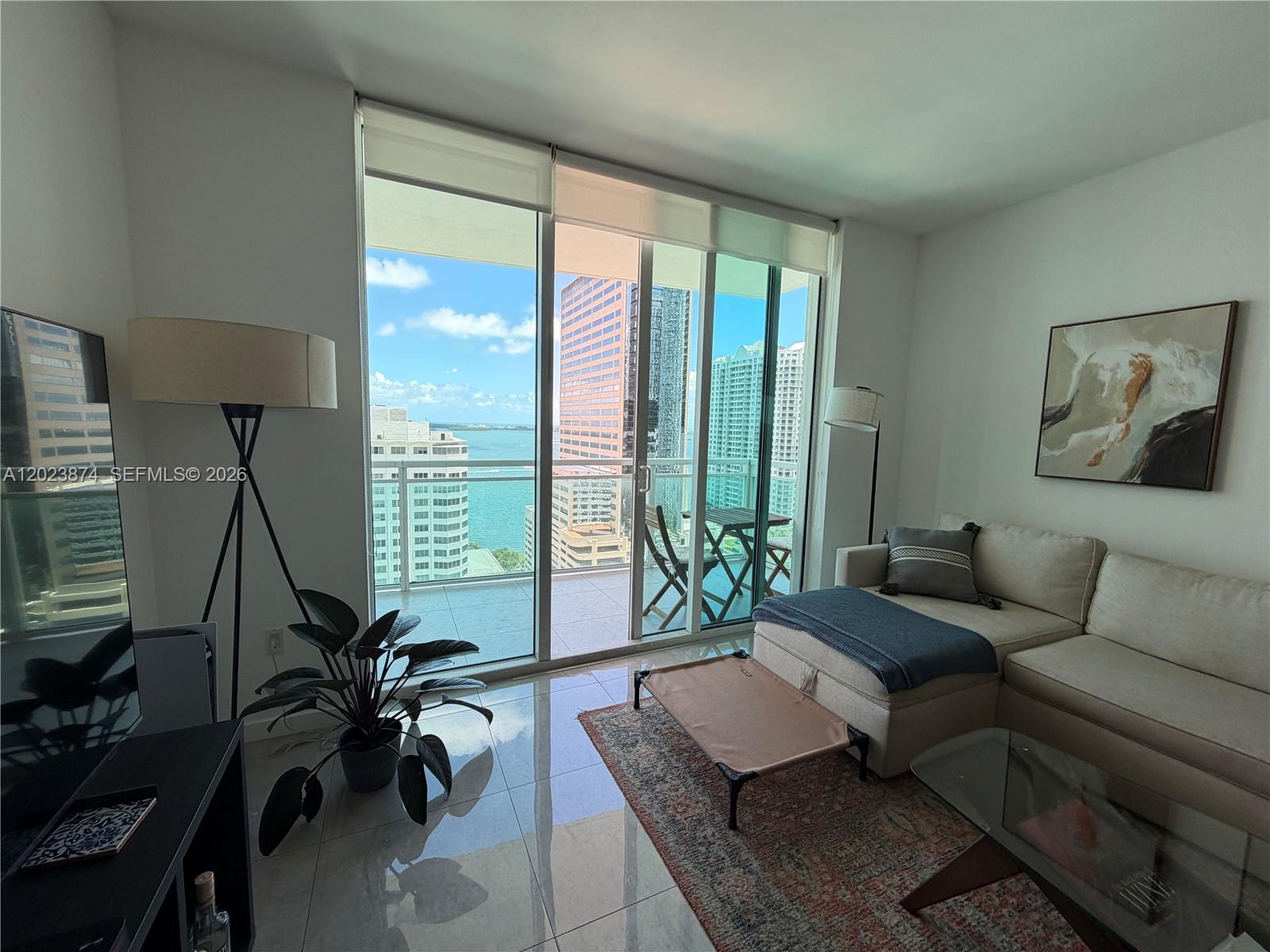 THE PLAZA 901 BRICKELL CO - Residential Lease
