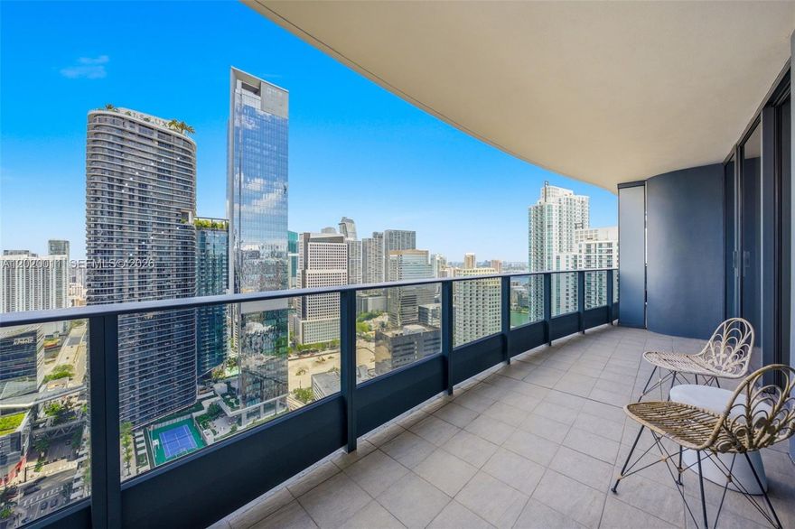 FLATIRON Unit #4014 offers a thoughtfully designed 1-bedroom, 1.5-bath residence with 870 square feet of interior living space, complemented by a spacious balcony with open water and city views. The home features built-in closets, window shades, warm wood finishes, double sinks, and a Jacuzzi tub. The kitchen is equipped with Miele appliances, blending functionality with refined design. One assigned parking space is included with valet service.

Designed by Ugo Colombo, the building reflects a strong emphasis on Italian craftsmanship and detail throughout its finishes and shared spaces. Residents enjoy a collection of amenities designed for both relaxation and everyday living, including a rooftop pool, spa, and fitness center, an 18th-floor lap pool, movie theater, wine, cigar, and billiards lounges, library, children’s playroom, bicycle storage, concierge, valet, and a digital resident app. Conveniently located along South Miami Avenue, the residence is within walking distance of Brickell City Centre, local restaurants, shops, and the energy of the Brickell financial district.