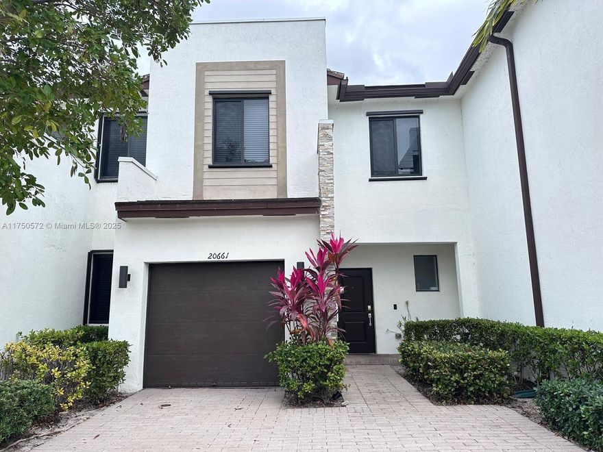 ADJUSTED PRICE FOR FAST SALE!! WELCOME FAMILIES & INVESTORS !!!Motivated seller ready to review and negotiate all the offers Stunning townhouse 1618sqft boasts 3 bedrooms and 2 1/2 bathrooms 1 CAR GARAGE  & a total of 3 Walking Closets, with Quartz countertops and stainless steel Appliances. This property is located in a gated community with Resort Style Amenities at the club house with a well-equipped gym, indoor playroom, party room for social gatherings, outdoor playground and a huge pool offering comfort and convenience location close to supermarkets, major highways and Shopping centers as aventura mall and near beaches. OK to lease right away. Come and make this your primary residence or your investment by acquiring capital gains.