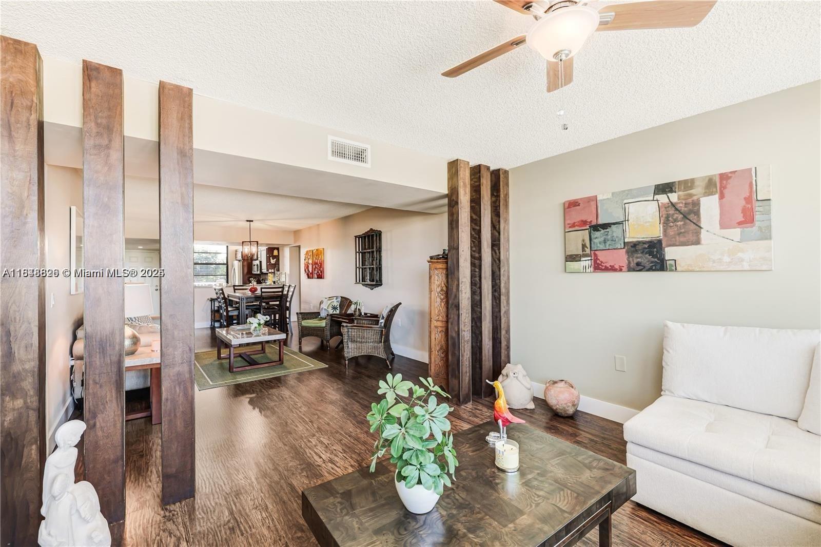 PERFECT FOR INVESTORS, TENANT OCCUPIED! This stunning 2-bedroom, 2-bathroom pool view condo features a versatile closed den, perfect for a small bedroom or a private office. Open layout that maximizes natural light, complemented by modern finishes throughout. The kitchen boasts sleek appliances and ample counter space, ideal for entertaining. Laundry room with full size washer and dryer in unit. New AC and water heater as well as impact windows. Experience resort-style living with access to community amenities, including a sparkling pool and clubhouse. Located in a vibrant community, you’re just moments away from shopping, dining, and recreational activities. Don’t miss this opportunity to enjoy luxury living in a prime location!
