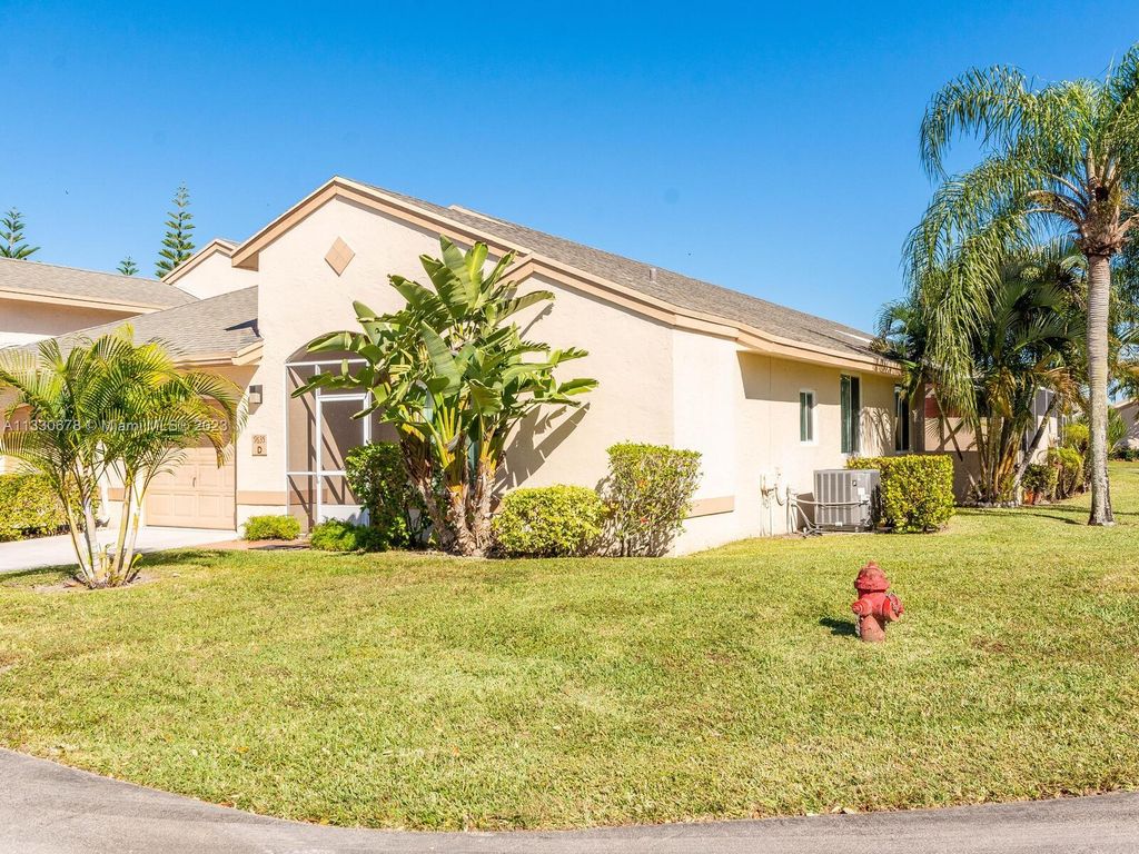 Photo of 9635 N Boca Gardens Cir N #D, Boca Raton, FL 33496 (MLS # A11330678)