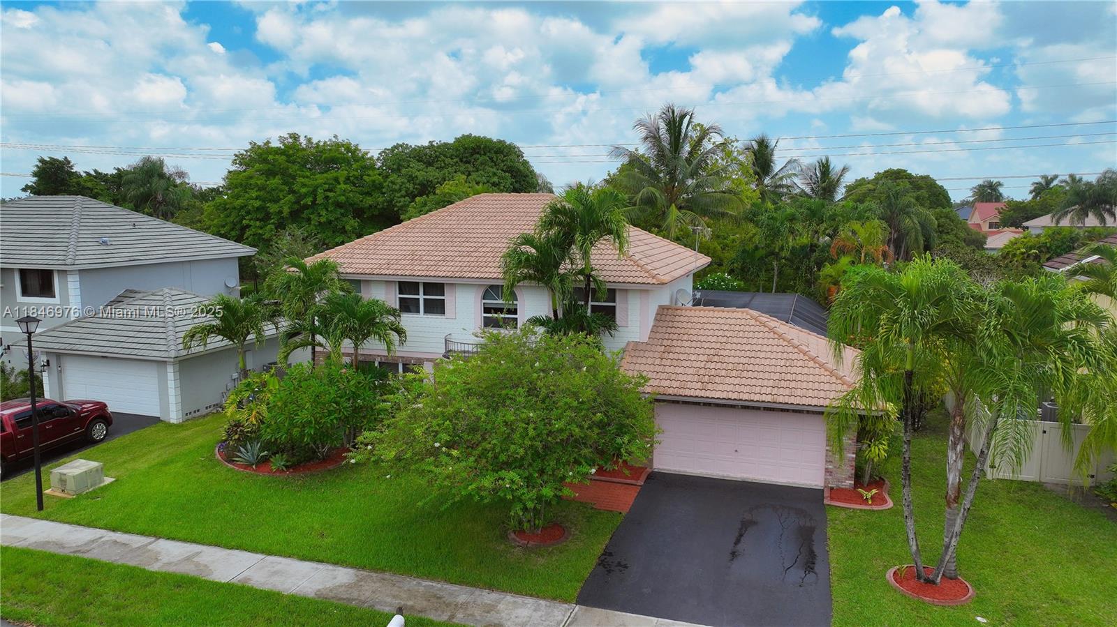 This stunning 4 Bedrooms/2.5 Baths home is located in one of Davie’s most desirable neighborhoods. High IMPACT WINDOWS and DOORS! BACK YARD LARGE OPEN VIEW! Beautiful screened in paved patio perfect for alfresco dining or lounging by the POOL. ELECTRIC CAR CHARGER OULET located in the garage. Tankless Water Heater.
Low-traffic Street, ideally located near tree-lined Shenandoah Park, featuring playgrounds, workout stations, a kids' water park as well as volleyball, tennis, and basketball courts. Zoned for top-rated schools. Immaculately maintained, move-in ready—perfect for family living. Great opportunity to call this your Home!