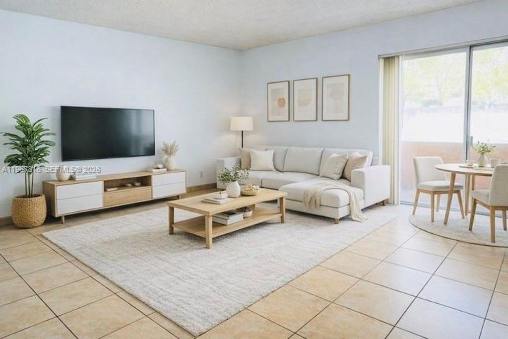 Photo of 4850 SW 63rd Ter #114, Davie, FL 33314 (MLS # A11967816)