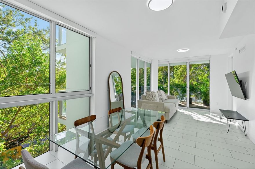 Step into this tropical and tranquil corner residence at IOS on the Bay. Perfectly located on Miami’s Upper East Side and Historic MIMO District—just steps from Morningside and Legion Park—this spacious split two-bedroom layout offers both privacy and functionality within a boutique waterfront community. Features include tile flooring throughout, generous storage, several upgraded appliances, including the washer and dryer, and a new AC in 2023. The split-bedroom design provides an ideal setup for a home office or guest suite. Additional highlights include two assigned parking spaces and a private storage locker. IOS on the Bay is a distinctive property in Miami, set within a primarily single-family residential neighborhood that offers a peaceful, community-oriented setting.